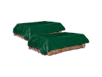 Two green PARKSIDE® tarpaulins covering stacked logs.