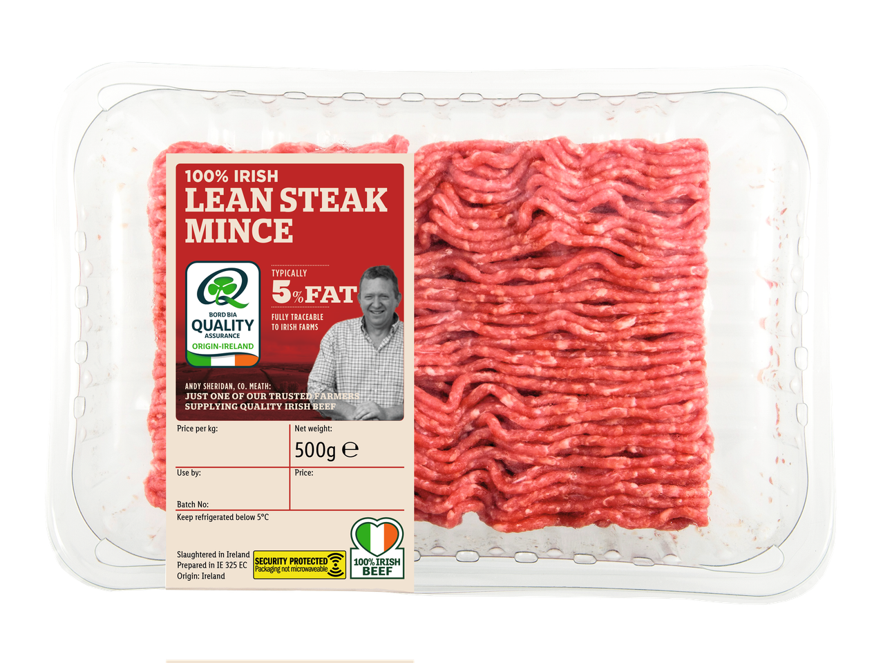 A clear plastic tray of Irish Lean Steak Mince with a red and white label showing product details.