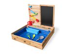 Wooden sand and water play table with a chalkboard, water run, and various toys.