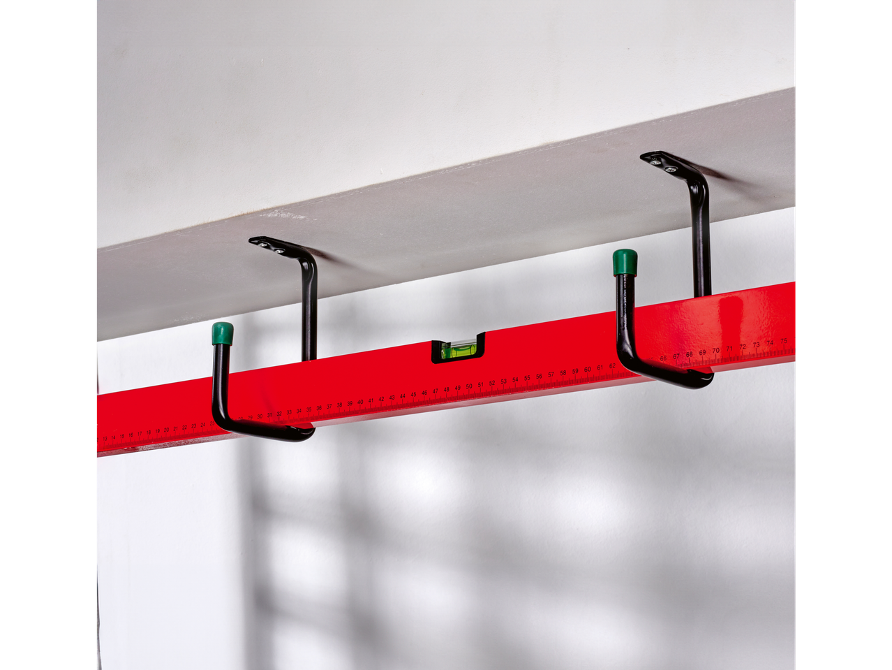Red level and ceiling hooks for tools.