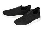 Pair of black slip-on sneakers with white soles