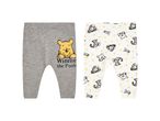 Due paia di leggings per neonati di Winnie the Pooh, uno grigio e uno bianco a fantasia.