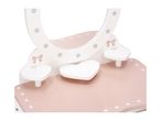 Pink and white wooden toy vanity table with heart-shaped shelves and mirror