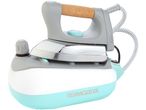 A Thermozeta steam iron with a light teal and gray design.