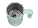 Light green milk frother with a whisk inside, showing MAX and MIN fill lines.