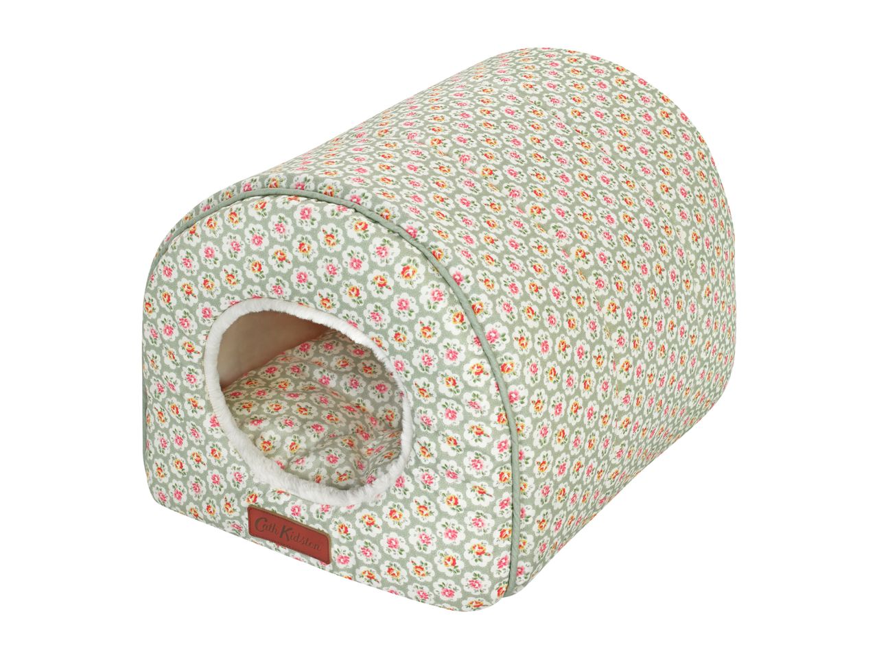 A Cath Kidston pet bed in a sage green floral print.