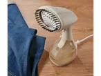 SILVERCREST® Garment Steamer with brush attachment next to blue jeans on a wooden surface.