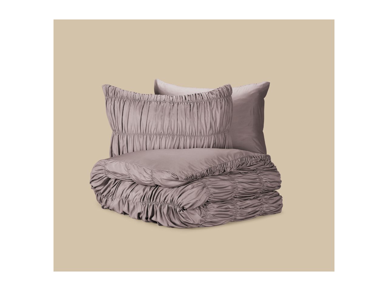Ruched duvet cover and pillowcase set in a dusty mauve color