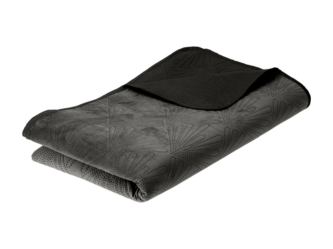 Folded dark grey quilted blanket with a subtle pattern, showing a black underside.