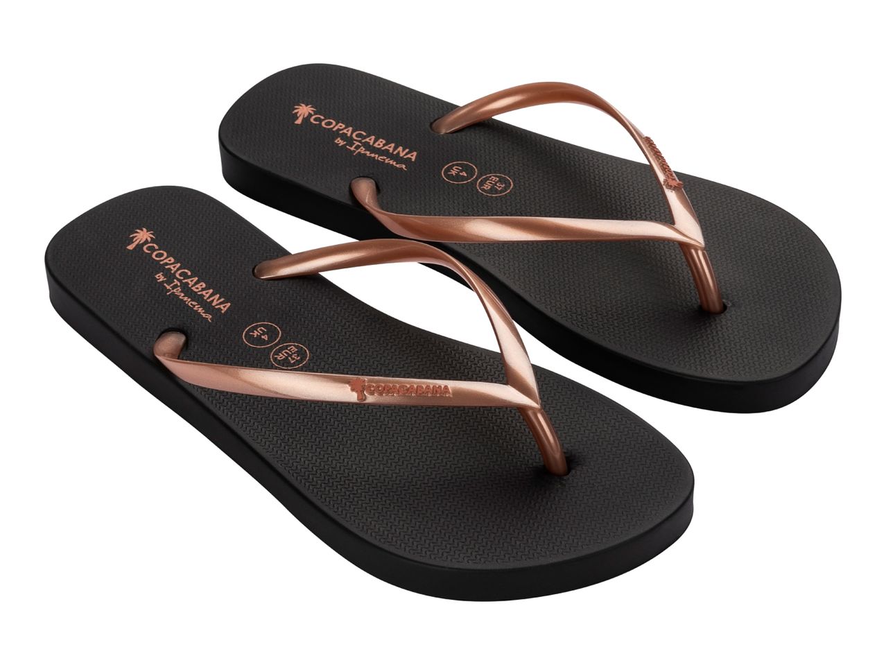 Pair of black flip-flops with rose gold straps, featuring a palm tree logo and text.