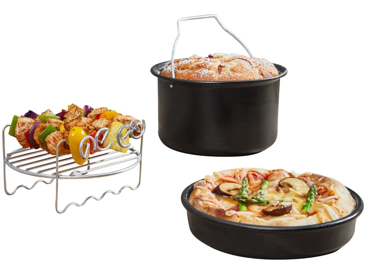 Air fryer accessories with cooked skewers, pizza, and cake.