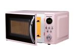 Pink SilverCrest microwave oven with the door open, displaying a digital clock.