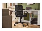 Black mesh office chair in a home office with a white desk and shelves.