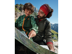 Father and son hiking, looking at a map, with a CRIVIT hiking backpack visible.