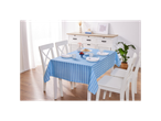 Blue and white striped tablecloth on a dining table with white chairs.