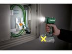A Parkside cordless work light illuminates a wall-mounted electrical box.