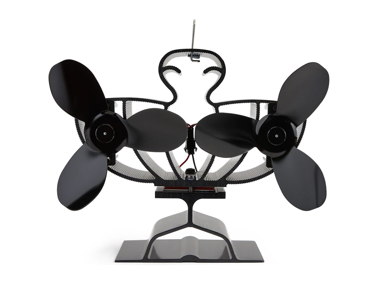 Black heat-powered stove fan with dual blades and a metal stand