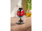 A red and black Silvercrest mini chopper with a clear bowl sits on a wooden surface.