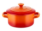 Orange ceramic cooking pot with lid and handles