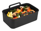Black silicone air fryer basket filled with mixed vegetables