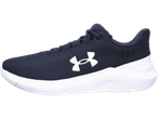 Ένα σκούρο μπλε αθλητικό παπούτσι Under Armour με λευκή σόλα.