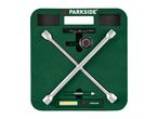Parkside tire changing kit with a cross wrench, pressure gauge, and flashlight.