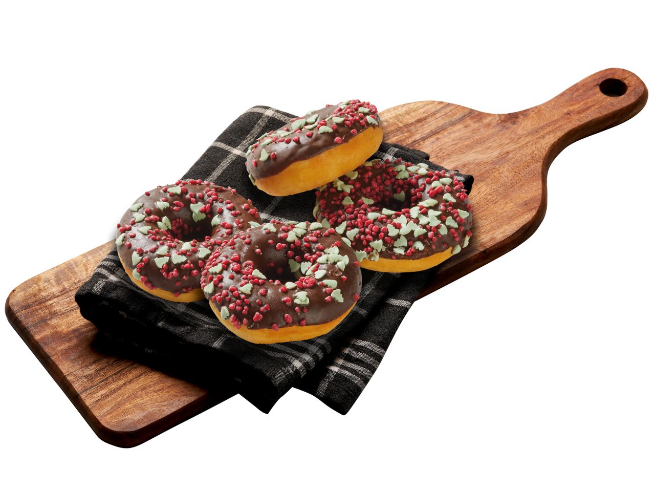 Chokladmunkar med strössel på en träbricka.