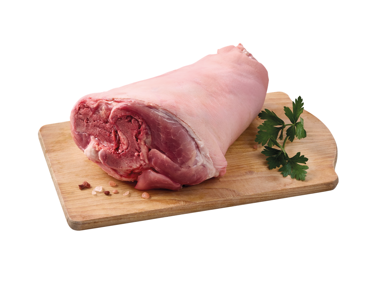 Cūkas stilbs uz koka dēlīša ar pētersīļiem un sāli.