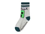 Grey sock with green and black pixelated character and text, dark green stripes and accents.