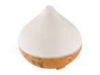 A white ceramic essential oil diffuser with a wooden base.