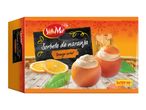 Orange sorbet in orange peels, with orange slices and leaves on a wooden surface.