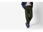 Men's Esmara joggers in dark green, paired with a navy jacket and blue sneakers.
