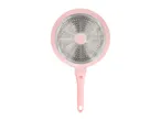Pink frying pan with a textured silver base, viewed from the bottom.