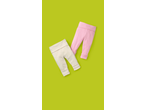 Two pairs of baby leggings, one pink and one cream, on a green background.