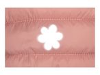 Close-up of a pink quilted jacket with a white flower-shaped cutout.