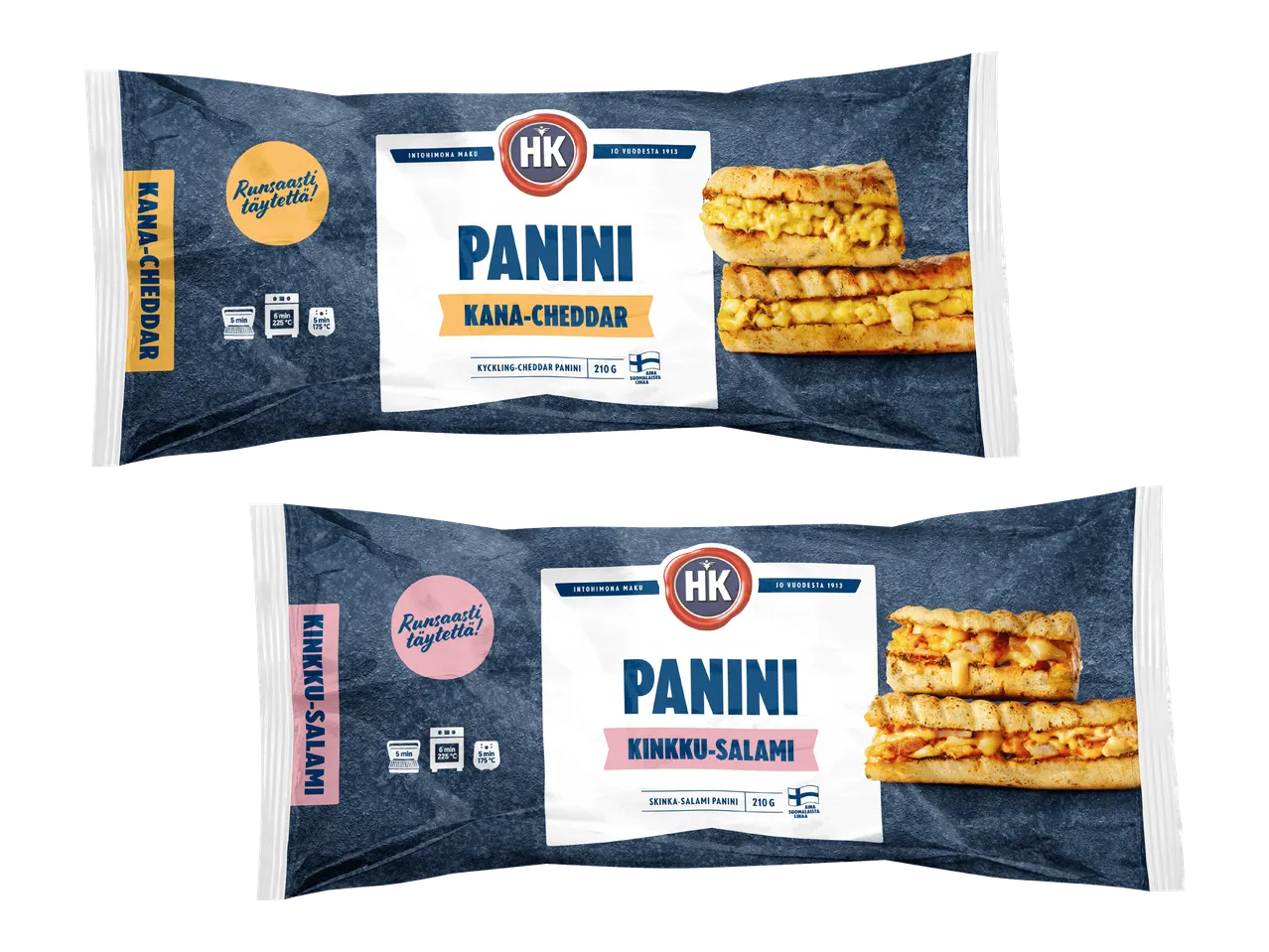 Kaksi pakkausta panineja: kana-cheddar ja kinkku-salami, joissa on runsaasti täytettä.