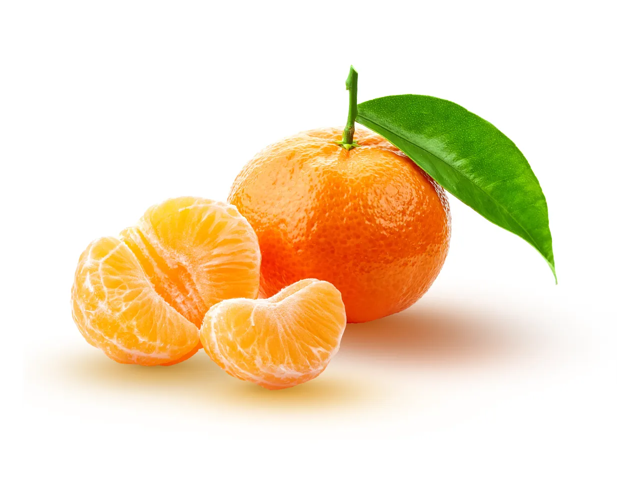 A whole tangerine with a green leaf and two peeled tangerine segments.