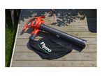 Flymo PowerVac 3000 leaf blower with collection bag on a wooden deck.