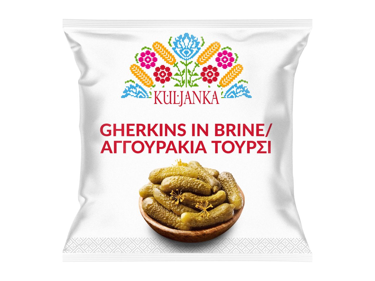 White pouch of gherkins in brine with a colorful folk art design and text.