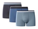 Three men's boxer briefs in dark blue, medium blue, and light blue, with striped waistbands.