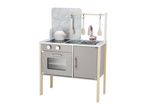 Grey and white toy kitchen with marble-effect backsplash, rose gold accents, and wooden utensils.