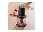 SilverCrest mini chopper with diced red onions on a wooden surface