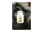 Air freshener shaped like a jar, with a label showing laundry on a clothesline.