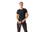 Woman in black Crivit® sports t-shirt and leggings, holding a water bottle.