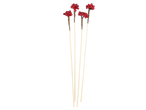 Decorative sticks with red berries for Christmas.