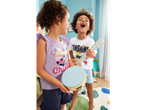Children playing with a tambourine and ukulele.