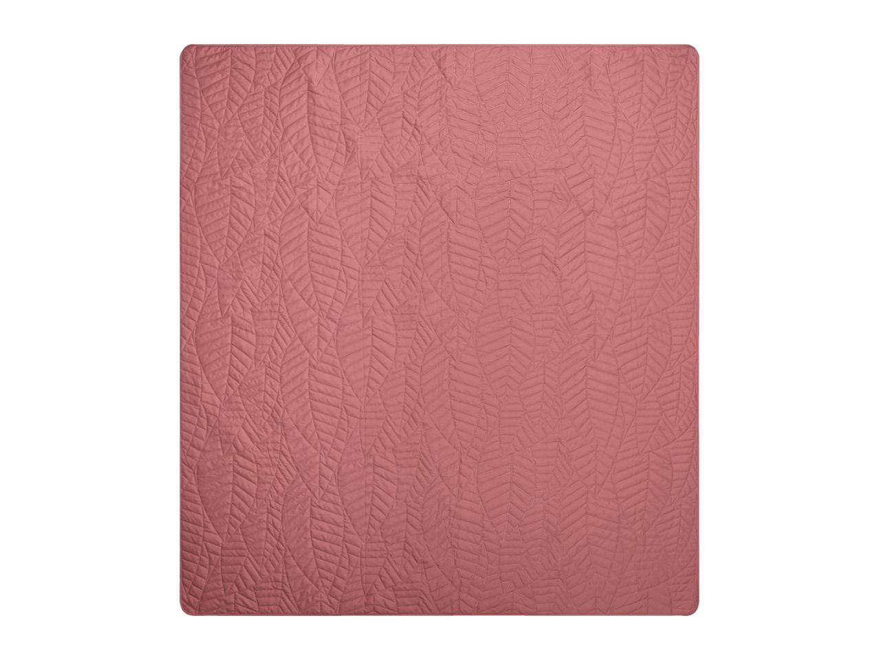 Pink quilted blanket with a leaf pattern