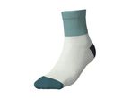 A white sock with a teal cuff and toe, and a black heel.
