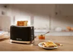 Silvercrest toaster with toast and jam on a wooden table.