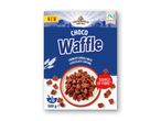 En pakke chokoladevafler med teksten 'NEW' og 'SOURCE OF FIBRE'.